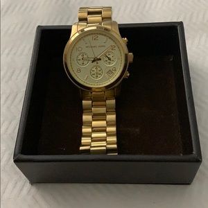Michael Kors gold women’s watch